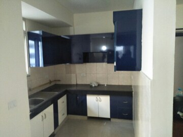 Kitchen in 2 BHK Apartment at Aims Golf City, Sector 75 – for Rent