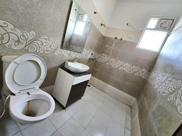 Bathroom in 3 BHK Apartment at Green Valley Heights, Dhakoli Village – for Sale