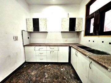 Kitchen in 2 BHK Builder Floor at Guru Nanak Enclave, Dhakoli Village – for Sale