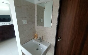Bathroom in 2 BHK Apartment at Shapoorji Pallonji Sensorium, Hinjewadi – for Rent
