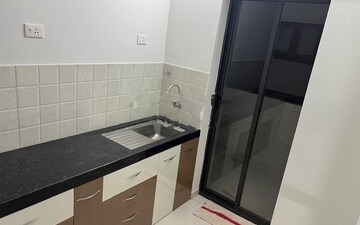 Kitchen in 2 BHK Apartment at Shapoorji Pallonji Sensorium, Hinjewadi – for Rent