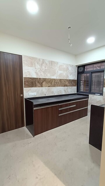 Kitchen in 3 BHK Apartment at Mamta Apartment Andheri, Andheri West – for Sale