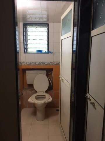 Bathroom in 1 BHK Apartment at Satya Darshan CHS, Andheri East – for Rent