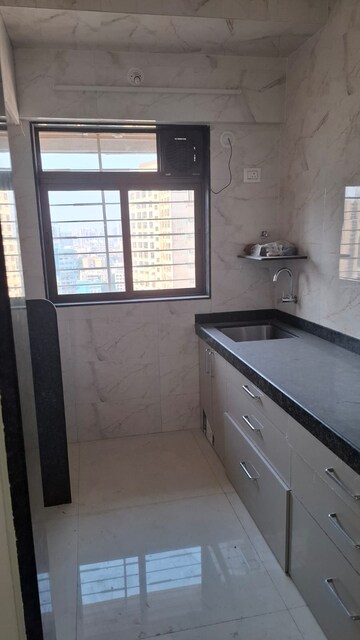 Kitchen in 1 BHK Apartment at Abhirekha Apartments, Kandivali West – for Rent