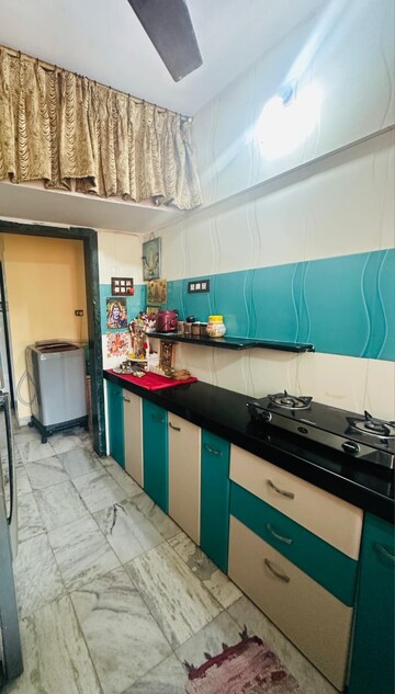 Kitchen in 1 BHK Apartment at Rachna Garden, Mulund West – for Rent