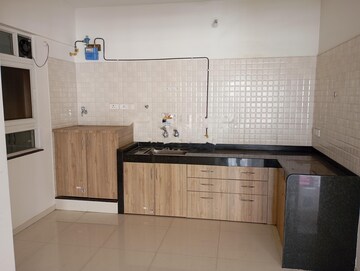 Kitchen in 2 BHK Apartment at Gera World of Joy, Kharadi – for Rent