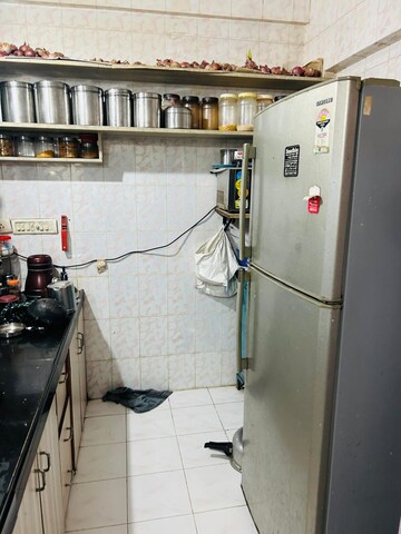 Kitchen in 3 BHK Apartment at Shanti Campus CHS, Mulund West – for Rent