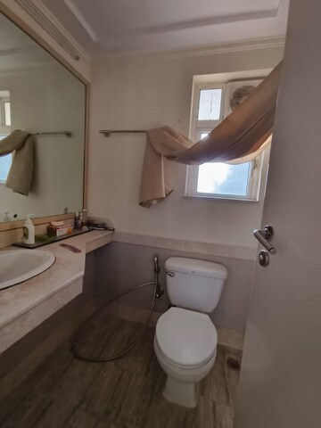 Bathroom in 2 BHK Apartment at Hiranandani Meadows, Manpada – for Rent