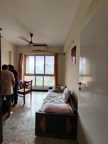 Living Room in 2 BHK Apartment at Hiranandani Meadows, Manpada – for Rent