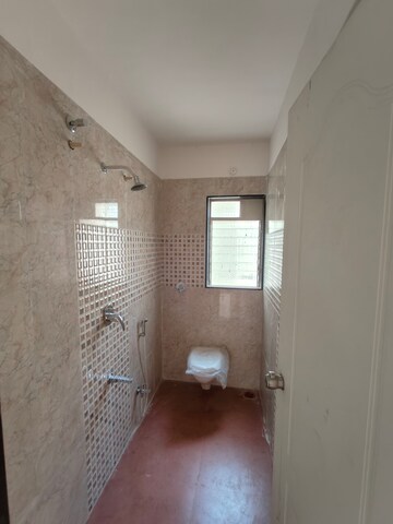 Bathroom in 2 BHK Apartment at Shree Tirupati Maple Tower, Kondhwa – for Rent