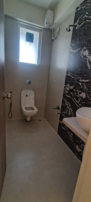 Bathroom in 2 BHK Apartment at Unique Ivana, Mira Road – for Rent