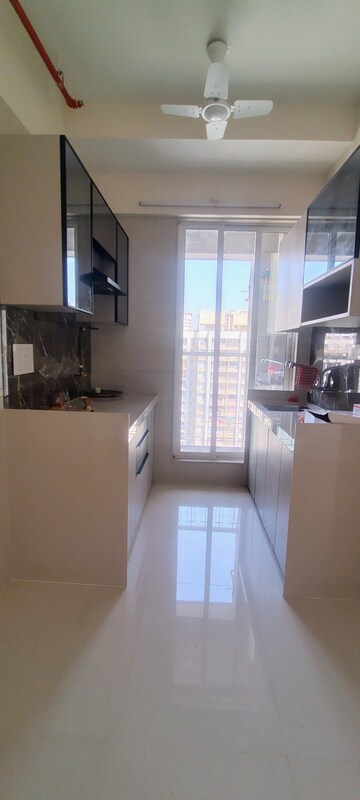 Kitchen in 2 BHK Apartment at Unique Ivana, Mira Road – for Rent