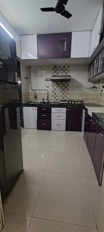 Kitchen in 3 BHK Apartment at Unique Heights CHS, Mira Road – for Rent
