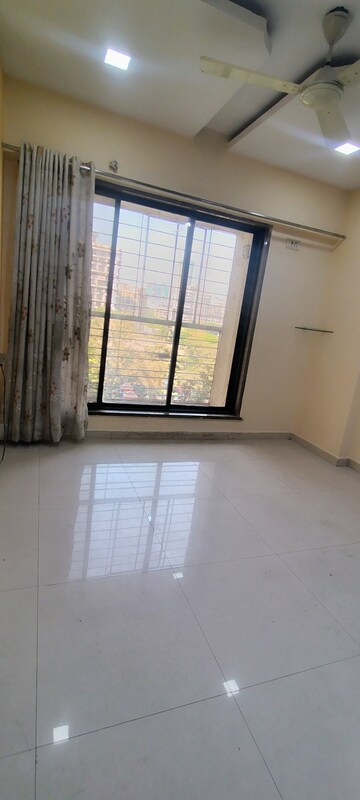 Bedroom in 3 BHK Apartment at Unique Heights CHS, Mira Road – for Rent