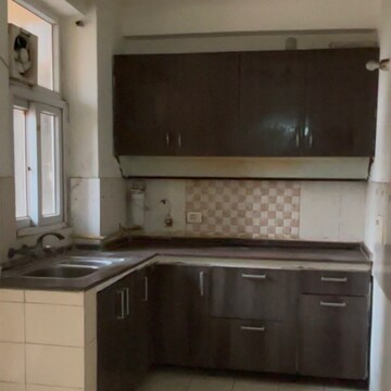Kitchen in 2.5 BHK Apartment at Amrapali Princely Estate, Sector 76 – for Rent