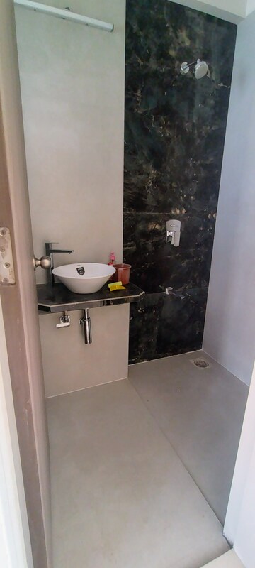 Bathroom in 2 BHK Apartment at Unique Ivana, Mira Road – for Rent