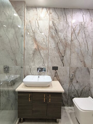 Bathroom in 4 BHK Builder Floor at Mianwali Nagar – for Sale