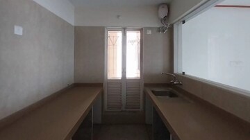 Kitchen in 2 BHK Apartment at Dosti West County, Balkum Pada – for Rent