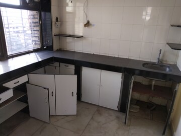 Kitchen in 4 BHK Apartment at Duplex Heights, Andheri West – for Sale