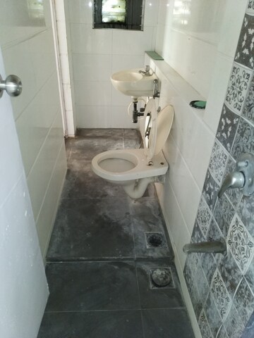Bathroom in 4 BHK Apartment at Duplex Heights, Andheri West – for Sale