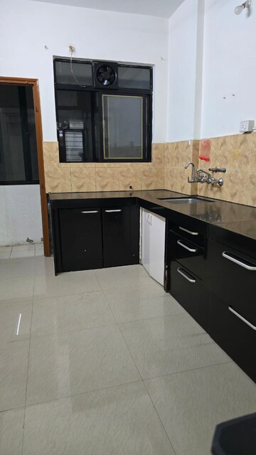Kitchen in 2 BHK Apartment at Sunshree Gold, Nibm Road – for Rent