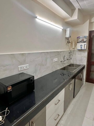 Kitchen in 2 BHK Builder Floor at ASF Towers, Udyog Vihar Phase 4 – for Rent