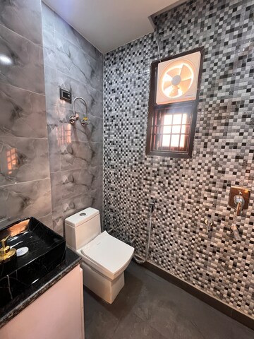 Bathroom in 3 BHK Builder Floor at Dwarka Mor – for Sale