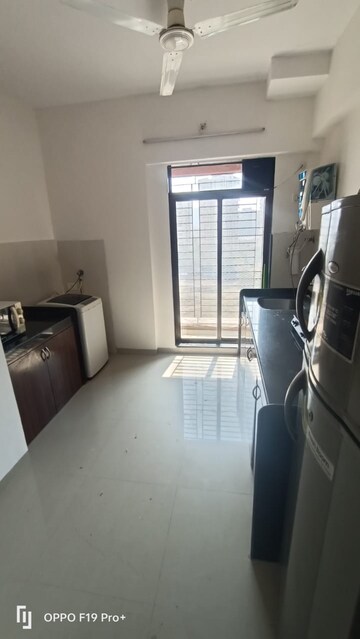 Kitchen in 2.5 BHK Apartment at Shree Satya Shankar Residency, Manpada – for Sale