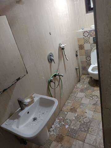 Bathroom in 2 BHK Apartment at Mohan Cooperative Industrial Estate – for Rent