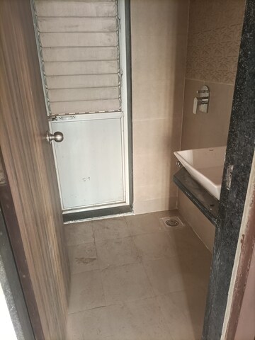 Bathroom in 1 BHK Apartment at Bhairaav Goldcrest Residency, Ghansoli – for Rent