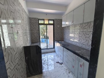 Kitchen in 2 BHK Apartment at Munish Queens Tower, Vasai East – for Sale