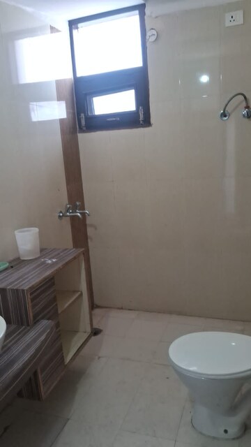 Bathroom in 2 BHK Apartment at Motia Blue Ridge, Dhakoli Village – for Rent