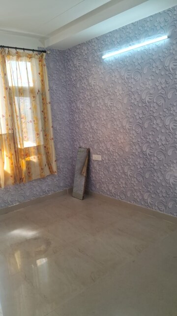 Living Room in 2 BHK Apartment at Motia Blue Ridge, Dhakoli Village – for Rent