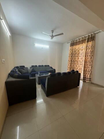 Living Room in 3 BHK Apartment at Sushma Elite Cross, Dhakoli Village – for Rent