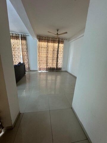 Living Room in 3 BHK Apartment at Sushma Elite Cross, Dhakoli Village – for Rent