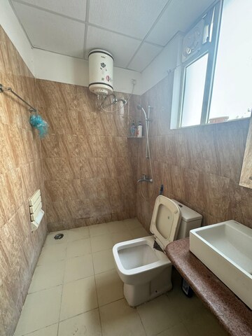 Bathroom in 3 BHK Apartment at Sushma Elite Cross, Dhakoli Village – for Rent