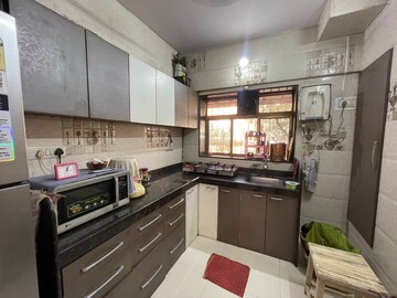 Kitchen in 3 BHK Apartment at Raj Umang 2, Dahisar East – for Sale