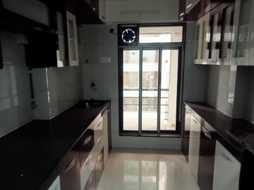 Kitchen in 2 BHK Apartment at Laxmi Paradise, Mira Road – for Rent