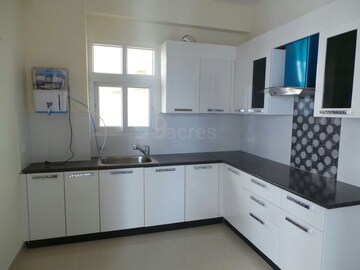 Kitchen in 2 BHK Apartment at Mahagun Mywoods II, Sector 16c Greater Noida – for Rent