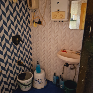 Bathroom in 1 BHK Apartment at Poonam Darshan, Poonam Nagar – for Rent