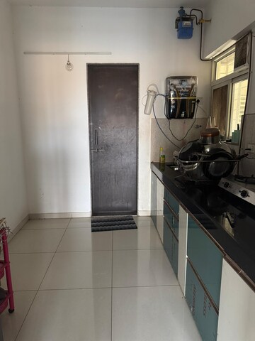 Kitchen in 3 BHK Apartment at Kalpataru Crescendo, Wakad – for Rent
