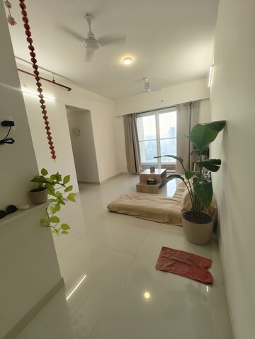 Living Room in 1 BHK Apartment at Ashar Axis, Majiwada – for Rent