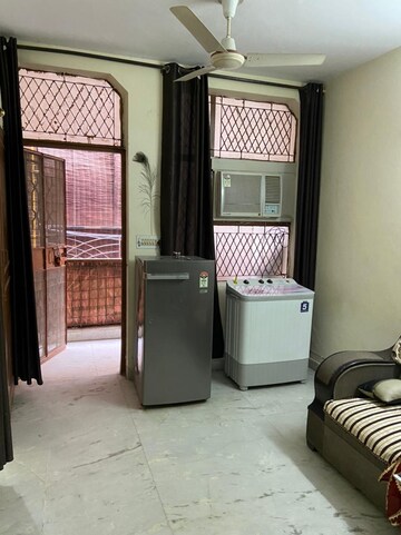 Living Room in 2 BHK Apartment at Govindpuri – for Sale