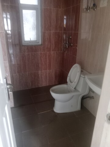 Bathroom in 3 BHK Apartment at Ansals Sushant City – for Rent