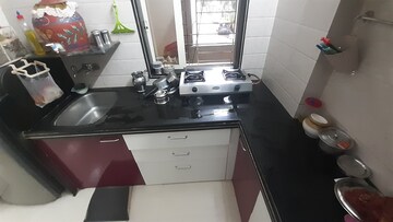 Kitchen in 2 BHK Apartment at Murbad Road – for Sale