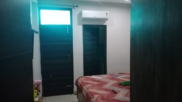 Bedroom in 3 BHK Builder Floor at Dhakoli Village – for Sale