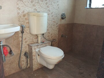 Bathroom in 2 BHK Apartment at Vedant Sumeet Elegance 360, Manpada – for Rent