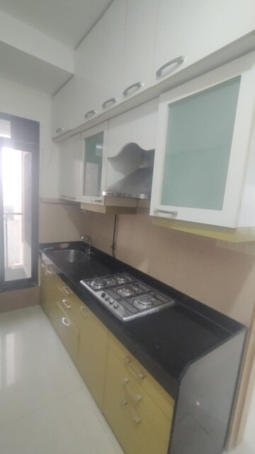 Kitchen in 2.5 BHK Apartment at Rustomjee Elanza, Malad West – for Rent
