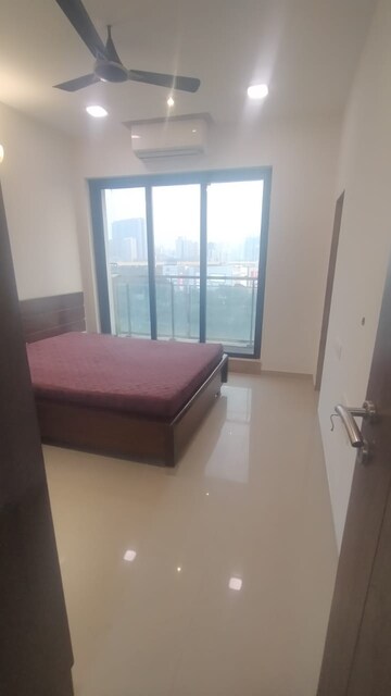Master Bedroom in 2.5 BHK Apartment at Rustomjee Elanza, Malad West – for Rent