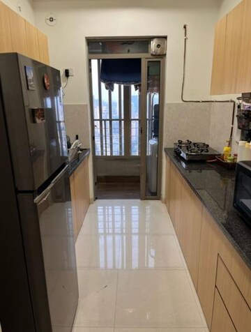 Kitchen in 2 BHK Apartment at Kalpataru Paramount, Kapur Bawdi – for Rent